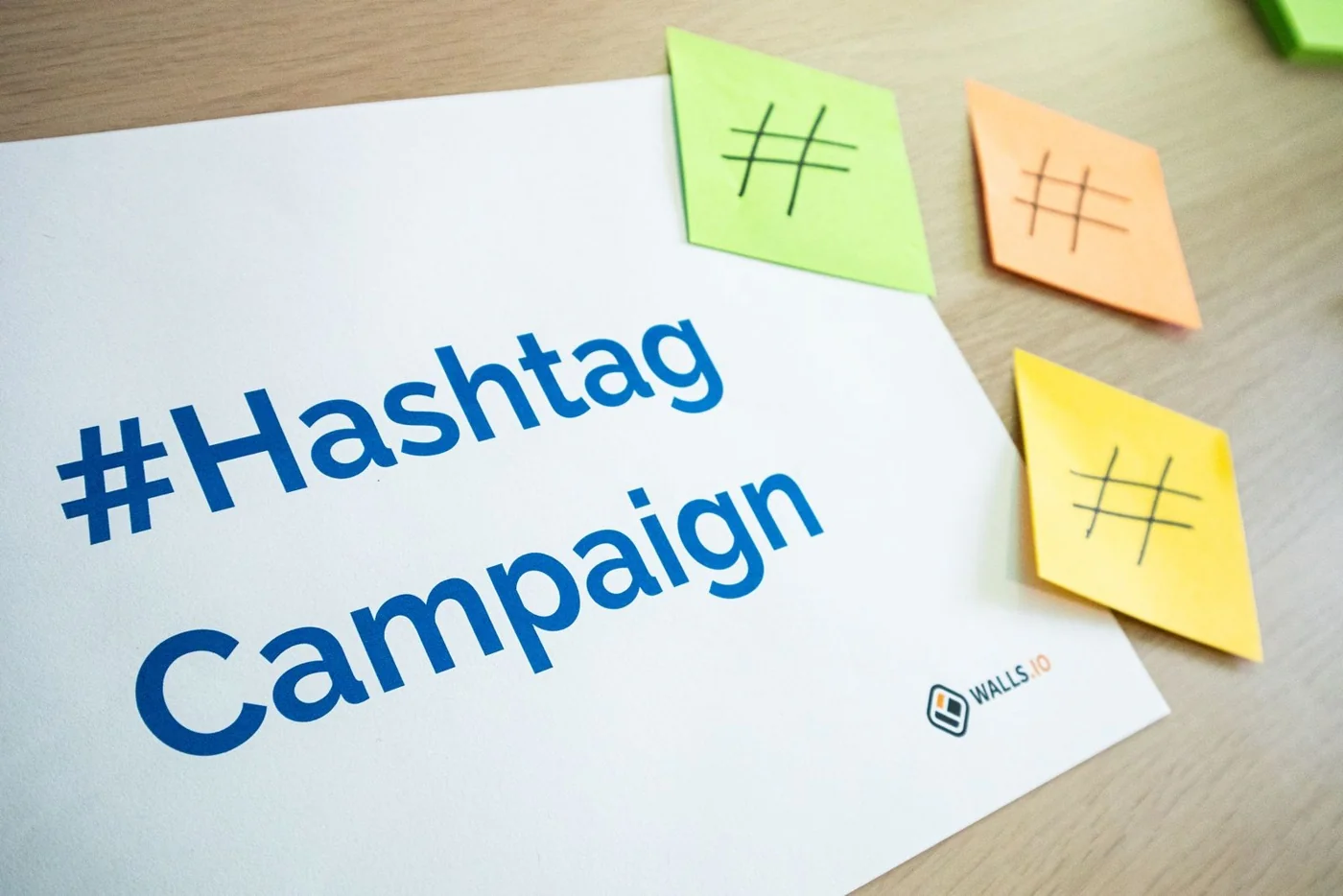 Campaign planning materials and colourful sticky notes on a desk