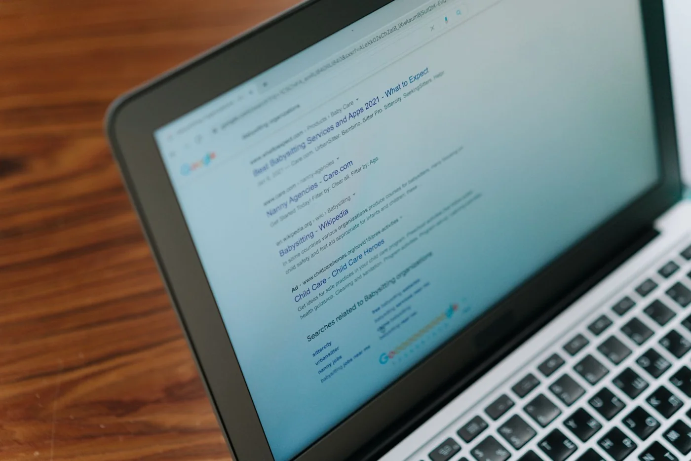 Google search results displayed on a laptop